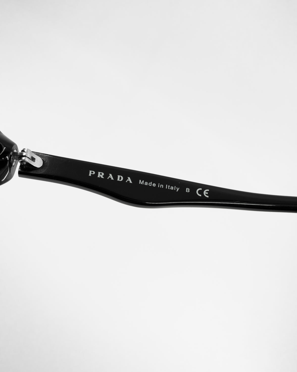 PRADA SWING SUNGLASSES