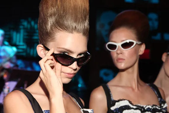 PRADA SWING SUNGLASSES