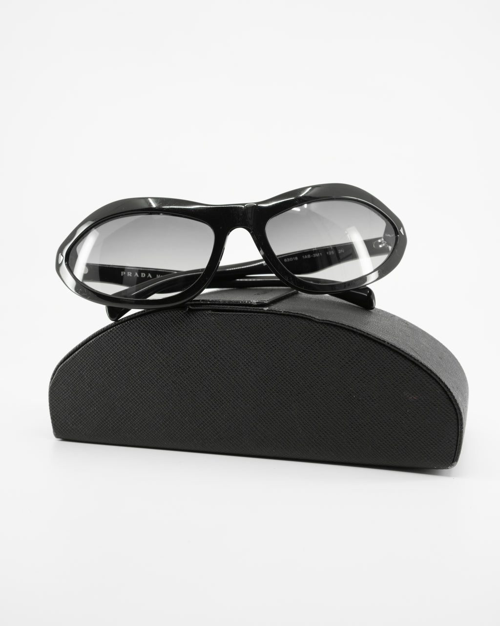 PRADA SWING SUNGLASSES