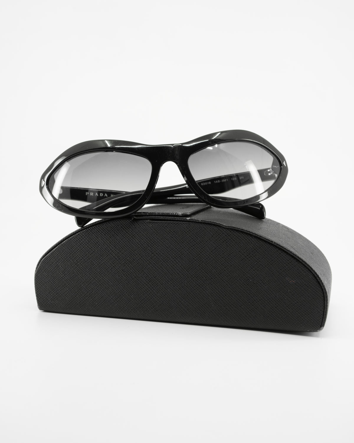 PRADA SWING SUNGLASSES