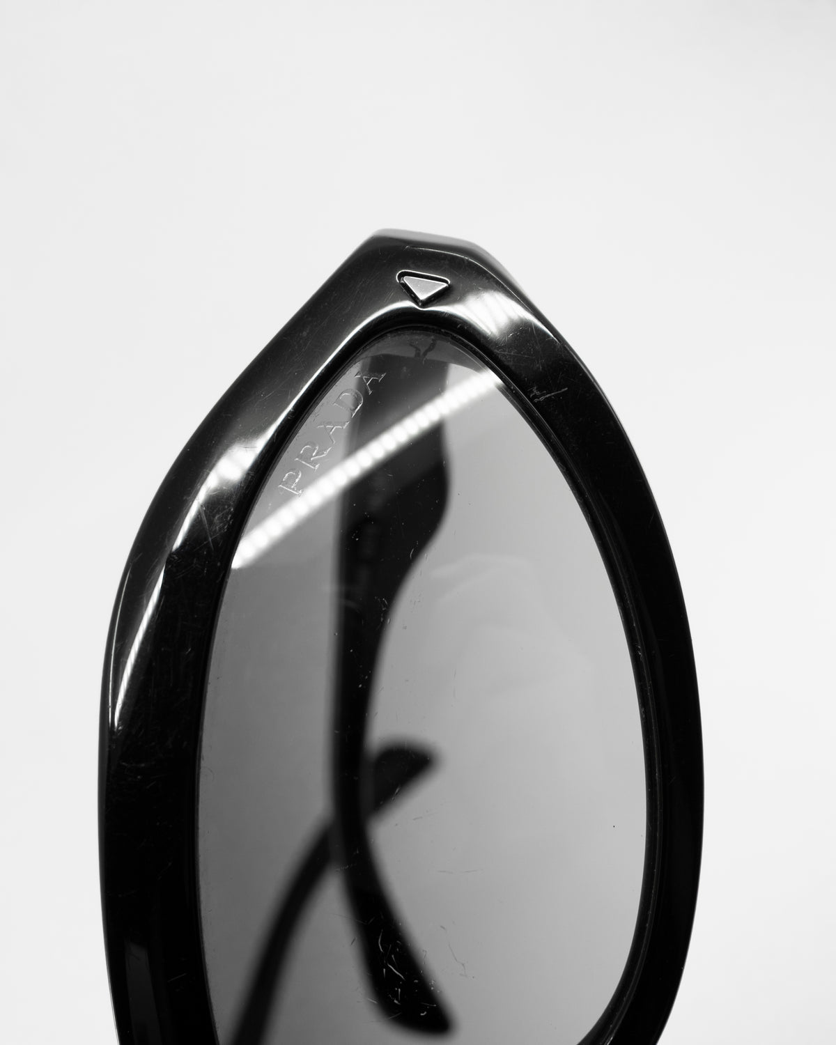 PRADA SWING SUNGLASSES